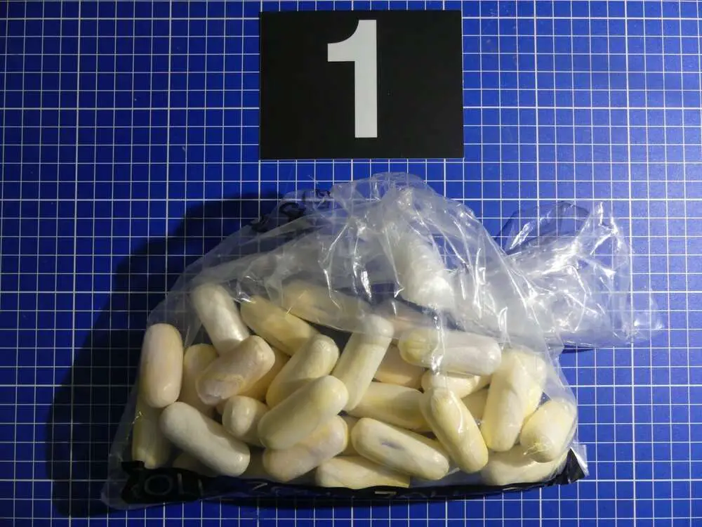 Read more about the article TUM-THING TO DECLARE? Cocaine Trafficker Seized After Complaining Of Stomach Ache