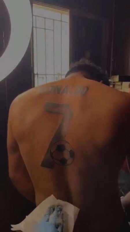Read more about the article NOW TAT’S A FAN: Ronaldo Super Fan Has Shirt Inked On Back