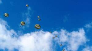 Read more about the article PARCEL FORCE: Troops Parachute In With Massive Air Drop Of Equipment