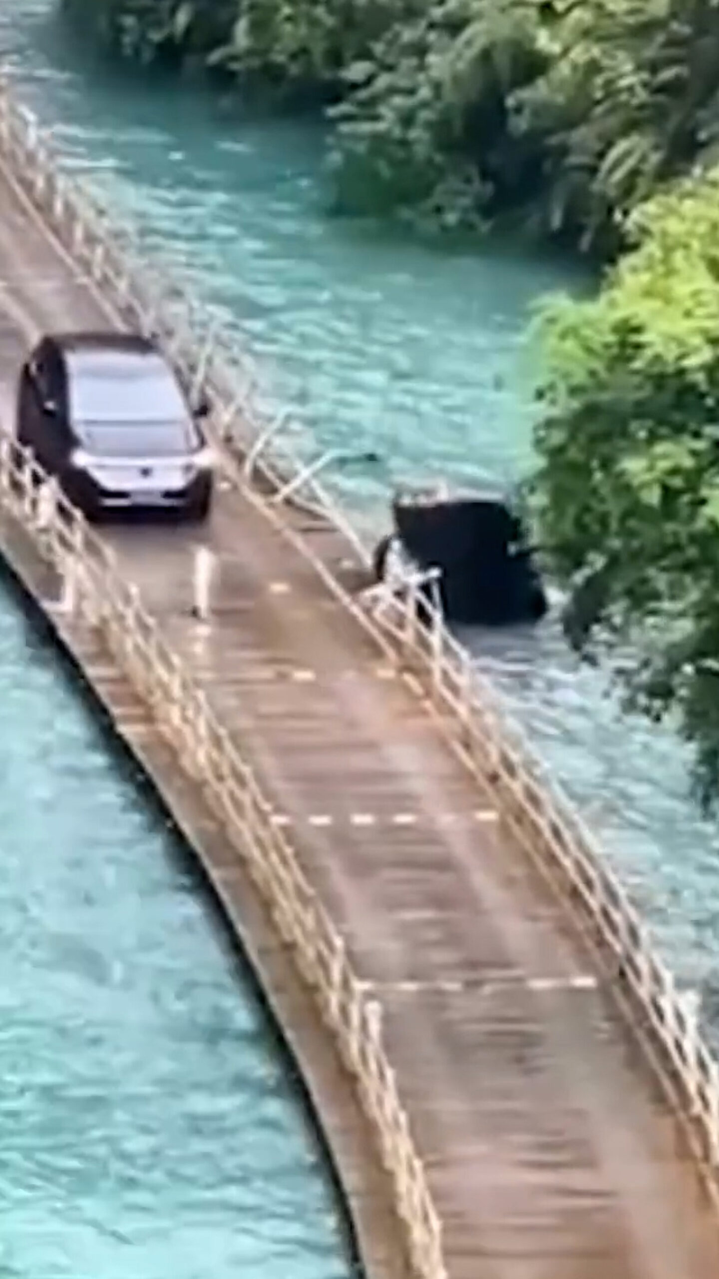 Read more about the article Five Killed After Tourist Van Crashes Off ‘World’s Most Beautiful Wooden Bridge’ Above River