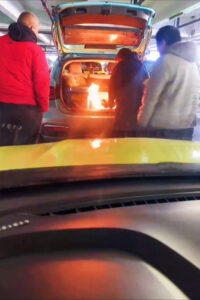 Read more about the article Female Taxi Driver Sacked After Being Caught Cooking Over Open Fire In Car’s Boot