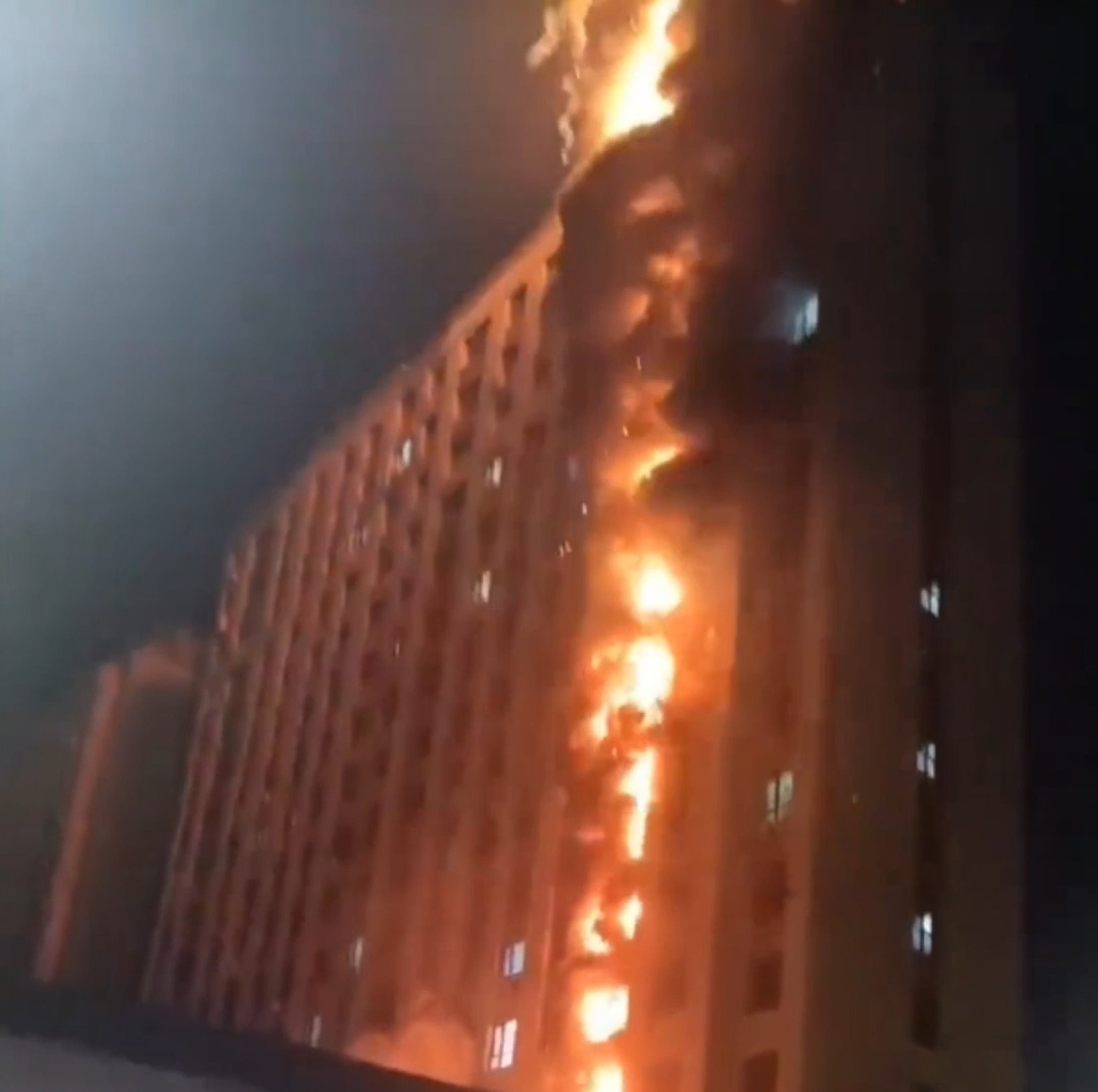 Read more about the article Building Gets Engulfed In Massive Fire From Ground Floor To Top As Frightened Bystanders Watch