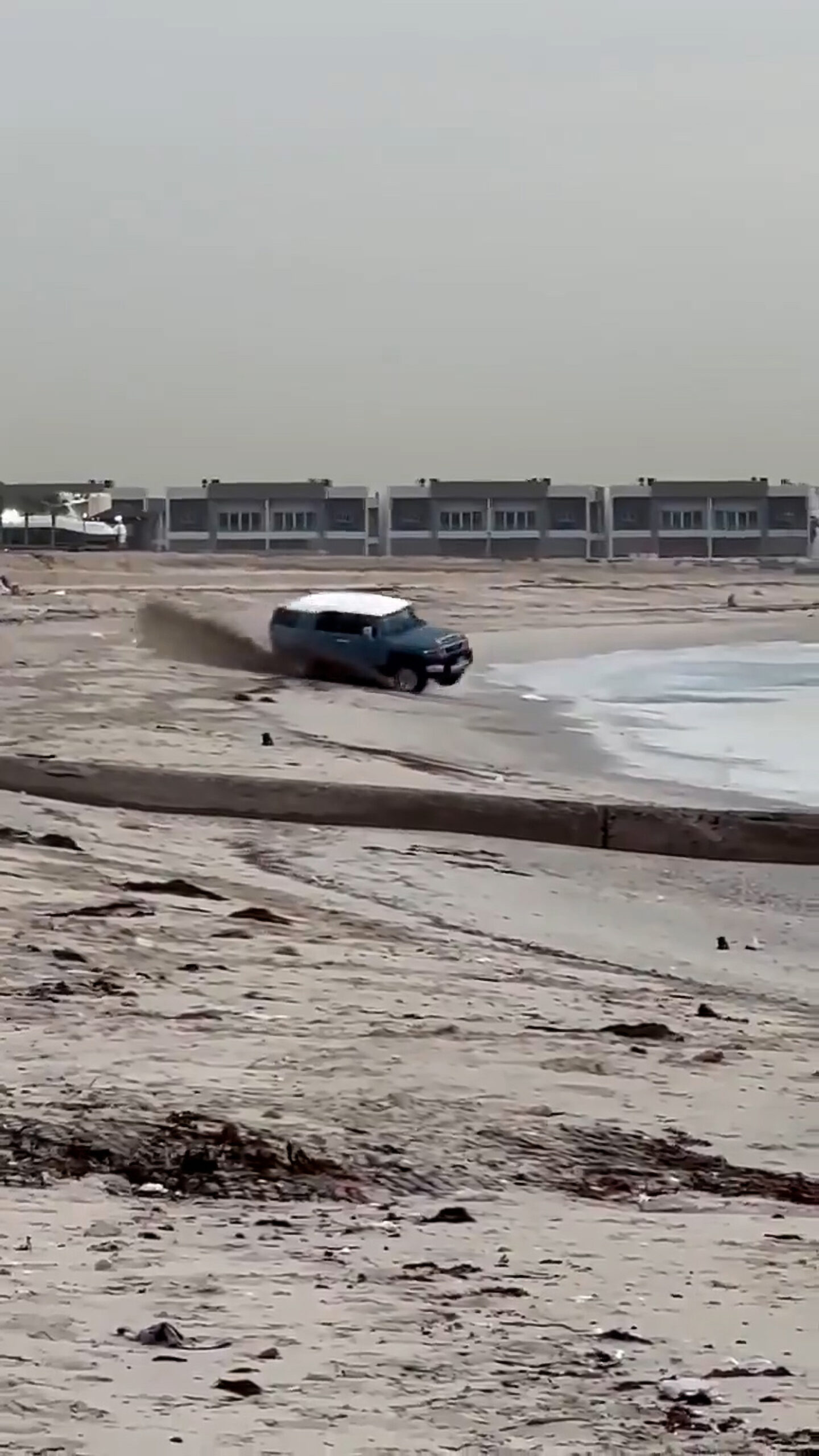 Read more about the article 4WD Flips Over On Beach And Sends Driver Flying Into Water