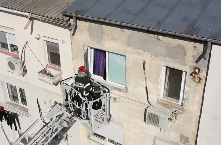 Fireman Frees Kitten Stuck In Tilted 4th Floor Window